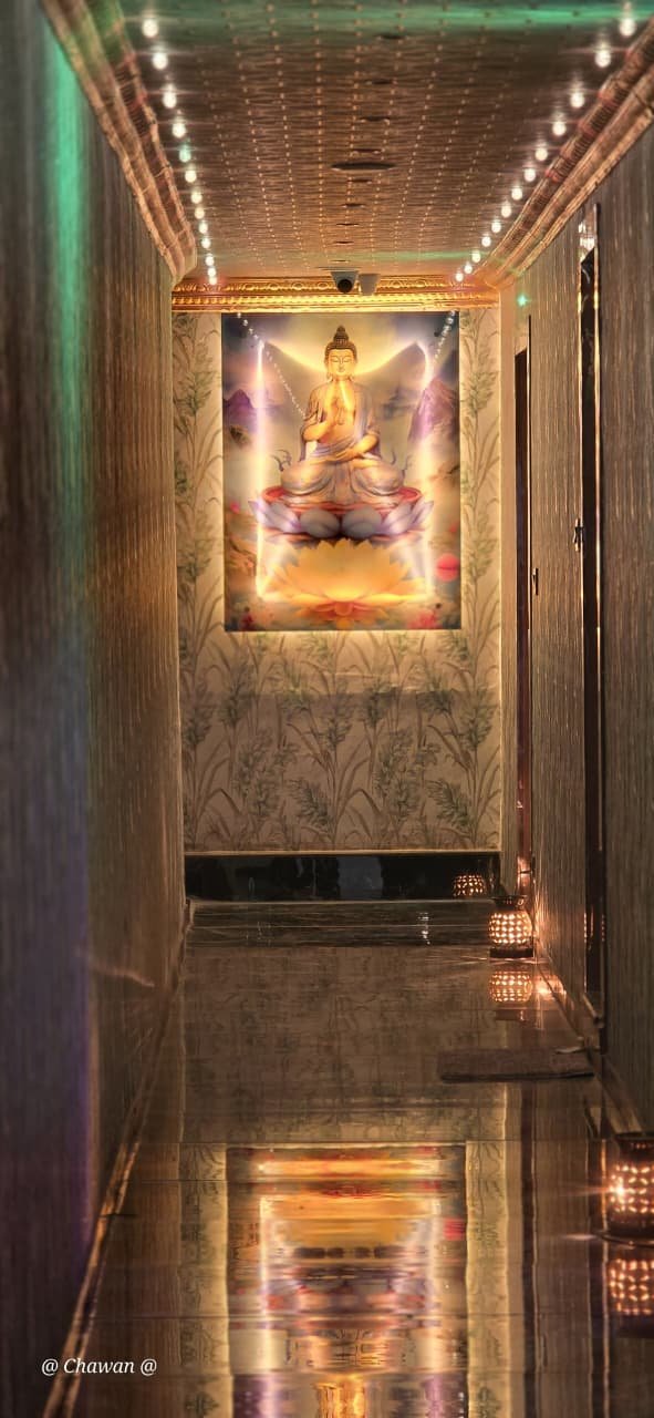 Illuminated corridor at Phoenix International Spa with warm golden lighting