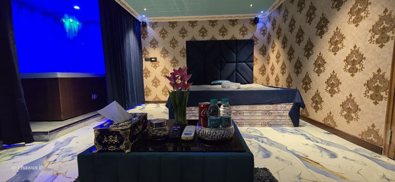 Private VIP room with bed and jacuzzi at Phoenix International Spa